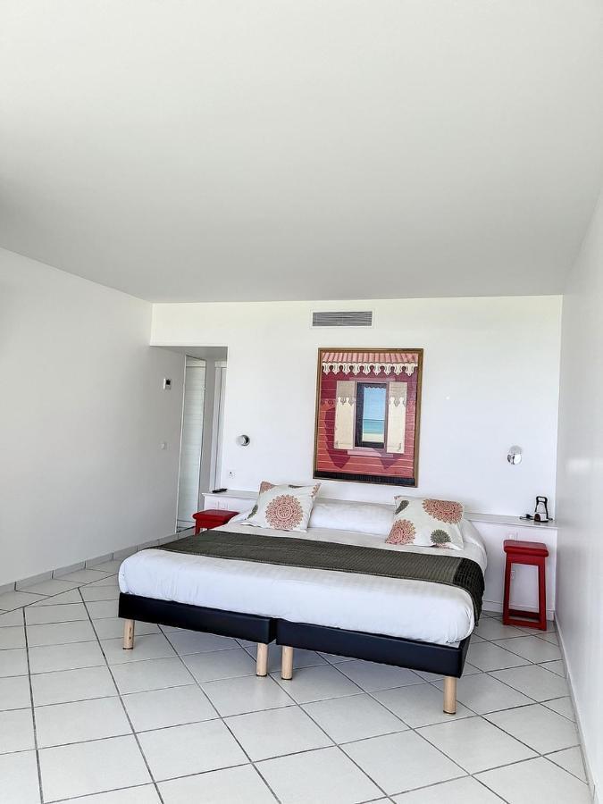 Le Domaine Anse Marcel Beach Resort Esterno foto
