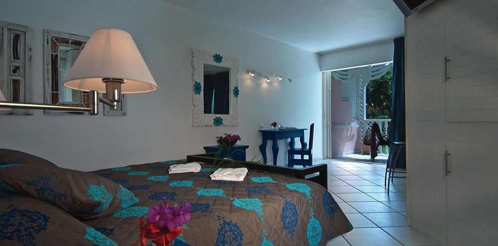 Le Domaine Anse Marcel Beach Resort Esterno foto